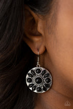 Load image into Gallery viewer, A collection of black beads and glittery black marquise style rhinestones swirl around the center of a shimmery silver disc, coalescing into a whimsical floral frame. Earring attaches to a standard fishhook fitting.  Sold as one pair of earrings.  Always nickel and lead free.