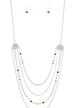 Load image into Gallery viewer, Attached to two ornate floral silver fittings, shimmery silver chains and strands of polished brown, black, and glassy crystal-like beads cascade across the chest for a whimsically layered look. Features an adjustable clasp closure.  Sold as one individual necklace. Includes one pair of matching earrings.