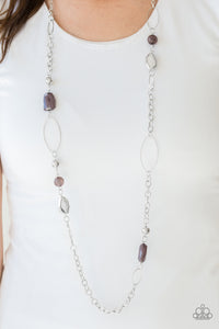 Featuring round and faceted shapes, smoky and shiny silver beads trickle along a bold silver chain for a seasonal look. Features an adjustable clasp closure.  Sold as one individual necklace. Includes one pair of matching earrings.