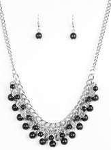 Load image into Gallery viewer, Earthy black stone beading cascades from the bottom of interlocking silver chains, creating an earthy fringe below the collar. Brushed in an antiqued shimmer, textured silver teardrops drip between the colorful beading for an artisan inspired finish. Features an adjustable clasp closure.  Sold as one individual necklace. Includes one pair of matching earrings.