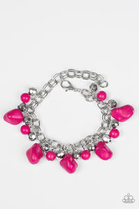 Featuring round and asymmetrical cuts, vivacious pink stones trickle from the bottom of a double chain-linked chain. Faceted silver beads trickle between the stones, adding a splash of metallic shimmer to the earthy fringe. Features an adjustable clasp closure.  Sold as one individual bracelet.  Always nickel and lead free.
