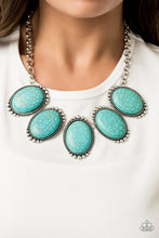Load image into Gallery viewer,  Chiseled into tranquil ovals, oversized turquoise stones are pressed into antiqued silver frames radiating with studded textures. The refreshing frames delicately link below the collar for a statement-making finish. Features an adjustable clasp closure.  Sold as one individual necklace. Includes one pair of matching earrings.A  Always nickel and lead free. 