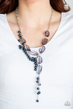 Load image into Gallery viewer, Featuring an array of shapes and cuts, a collection of faceted smoky gems link below the collar for a glamorous shimmer. A shimmery silver strand of pearly blue beads trickles down one side of the piece, creating a flirtatious extended pendant. Features an adjustable clasp closure.  Sold as one individual necklace. Includes one pair of matching earrings.  Always nickel and lead free.