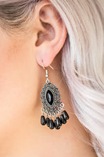 Load image into Gallery viewer, A faceted black bead is pressed into the center of a studded silver frame radiating with antiqued filigree. Matching black beads swing from the bottom of the frame, creating a whimsical fringe. Earring attaches to a standard fishhook fitting.  Sold as one pair of earrings.  Always nickel and lead free.