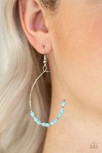 Load image into Gallery viewer, Dainty silver beads and faceted opaque blue beads are threaded along a dainty silver wire, creating a colorful hoop. Earring attaches to a standard fishhook fitting.  Sold as one pair of earrings.  Always nickel and lead free.