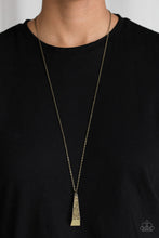 Load image into Gallery viewer, Encrusted in glittery aurum rhinestones, a triangular-shaped pendulum swings from the bottom of a lengthened brass chain for an edgy look. Features an adjustable clasp closure.  Sold as one individual necklace. Includes one pair of matching earrings.  Always nickel and lead free.