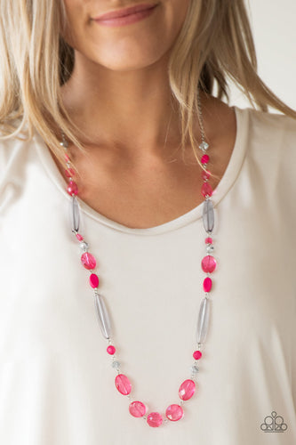 Varying in shape and shimmer, faceted pink and metallic crystal-like beads trickle down the chest for a whimsical look. Features an adjustable clasp closure.  Sold as one individual necklace. Includes one pair of matching earrings.