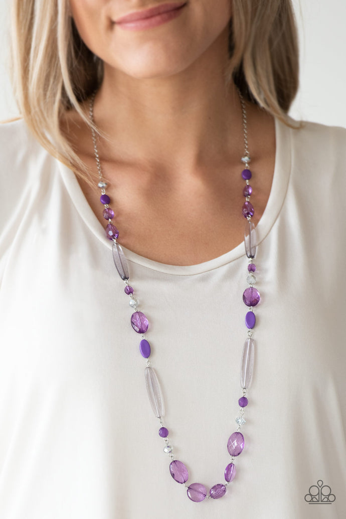 Varying in shape and shimmer, faceted purple and metallic crystal-like beads trickle down the chest for a whimsical look. Features an adjustable clasp closure.  Sold as one individual necklace. Includes one pair of matching earrings. 
