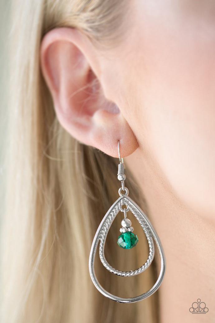 A green crystal-like bead swings from the top of a double teardrop frame radiating with smooth and rope-like textures for a refined look. Earring attaches to a standard fishhook fitting.  Sold as one pair of earrings.  Always nickel and lead free.