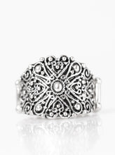 Load image into Gallery viewer, Brushed in an antiqued shimmer, silver filigree climbs the finger, swirling into a rustic floral frame. Features a stretchy band for a flexible fit.  Sold as one individual ring.