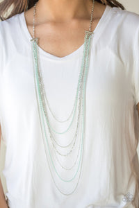  Mismatched silver chains alternate with dainty green chains down the chest, creating a colorful industrial look. Features an adjustable clasp closure.  Sold as one individual necklace. Includes one pair of matching earrings.  Always nickel and lead free.