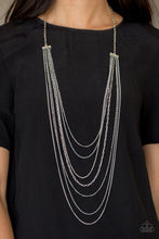 Load image into Gallery viewer, Mismatched silver chains alternate with dainty gray chains down the chest, creating a colorful industrial look. Features an adjustable clasp closure.  Sold as one individual necklace. Includes one pair of matching earrings.  Always nickel and lead free.