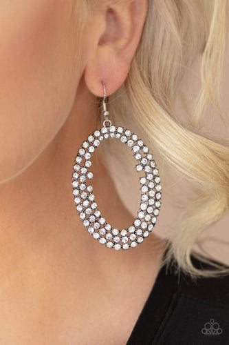 Row after row of glittery white rhinestones encircle into an oversized hoop, creating a gritty glamorous look. Earring attaches to a standard fishhook fitting.  Sold as one pair of earrings.  Always nickel and lead free.  Life of the Party June 2020