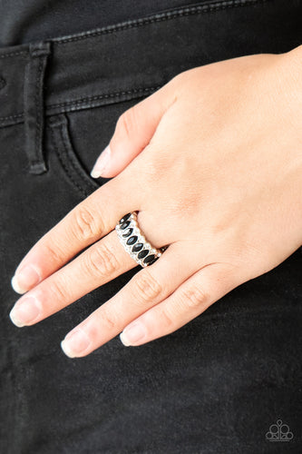 Featuring regal marquise style cuts, glittery black rhinestones are encrusted down the center of a silver band radiating with glassy white rhinestones for an edgy look. Features a stretchy band for a flexible fit.  Sold as one individual ring.  Always nickel and lead free.