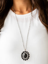 Load image into Gallery viewer, Radiating with black stone accents, a dramatic floral pendant swings from the bottom of a lengthened silver chain for a seasonal look. Features an adjustable clasp closure.  Sold as one individual necklace. Includes one pair of matching earrings.