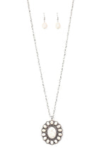 Load image into Gallery viewer, Radiating with white stone accents, a dramatic floral pendant swings from the bottom of a lengthened silver chain for a seasonal look. Features an adjustable clasp closure.  Sold as one individual necklace. Includes one pair of matching earrings.