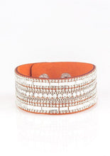 Load image into Gallery viewer, Featuring classic round and edgy emerald style cuts, glittery white rhinestones and glistening silver chains are encrusted along bands of orange suede for a sassy look. Features an adjustable snap closure.  Sold as one individual bracelet. 