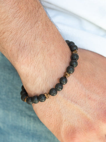 Essential Oil Alert!!  An earthy collection of coppery accents and black lava beads are threaded along a stretchy band around the wrist for a seasonal look.  Sold as one individual bracelet.  Always nickel and lead free.