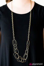 Load image into Gallery viewer, Glistening brass accents join into a web of layered chains. Brushed in a glistening finish, classic brass chains gives way to sections of bolder links as it drapes across the chest for a retro finish. Features an adjustable clasp closure.  Sold as one individual necklace. Includes one pair of matching earrings.
