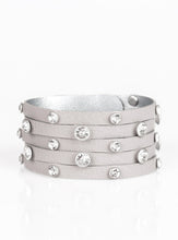 Load image into Gallery viewer, Dotted with glassy white rhinestones, a thick gray leather band has been spliced into five glittery strands around the wrist for a sassy look. Features an adjustable snap closure.  Sold as one individual bracelet.