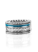 Load image into Gallery viewer, A shiny blue strip of color runs along the bottom of a row of glassy white rhinestones. Infused with silver textures, the mismatched details coalesce into one thick band across the finger. Features a stretchy band for a flexible fit.  Sold as one individual ring.  Always nickel and lead free.