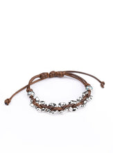 Load image into Gallery viewer, Shiny brown cording weaves through hammered silver beads around the wrist for an urban look. Features an adjustable sliding knot closure.  Sold as one individual bracelet.