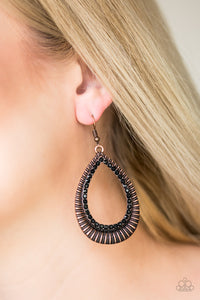Glittery black rhinestones spin around the center of an antiqued copper teardrop radiating with shimmery textures for an edgy look. Earring attaches to a standard fishhook fitting.  Sold as one pair of earrings.  Always nickel and lead free.