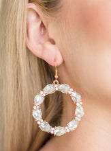 Load image into Gallery viewer, Glittery white rhinestones and white teardrop gems circle into a sparkling hoop for a glamorous look. Earring attaches to a standard fishhook fitting.  Sold as one pair of earrings.  