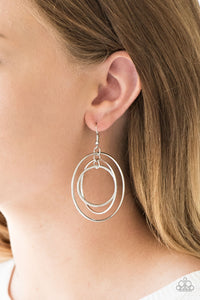Smooth and serrated silver hoops trickle from the ear, linking into a dizzying lure. Earring attaches to a standard fishhook fitting.  Sold as one pair of earrings.  Always nickel and lead free.