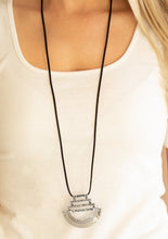 Load image into Gallery viewer,  A hammered crescent plate attaches to three hammered rectangular frames that link into a bold silver pendant at the bottom of an earthy strand of black suede. Features an adjustable clasp closure.  Sold as one individual necklace. Includes one pair of matching earrings.  Always nickel and lead free.