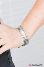 Load image into Gallery viewer, Etched in tactile textures, six shimmery bangles connect to two silver bars, creating a layered cuff. As the cuff slides up and down the wrist, it creates the illusion of a stack of classic bangles.  Sold as one individual bracelet.  Always nickel and lead free.