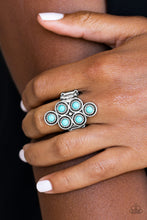 Load image into Gallery viewer, Dainty turquoise stones are pressed into ornate silver frames, coalescing into an earthy frame atop the finger. Features a stretchy band for a flexible fit.  Sold as one individual ring.  Always nickel and lead free.