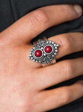 Load image into Gallery viewer, Two flat red beads sit atop one another, creating an elongated frame down the finger. Brushed in an antiqued finish, shiny silver studs dance around the stacked frames for an artisanal finish. Features a stretchy band for a flexible fit.  Sold as one individual ring.  