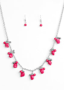 Varying in shape and size, shiny silver beads and vivacious pink stone beading swing from the bottom of a shimmery silver chain, creating a colorful fringe below the collar. Features an adjustable clasp closure.  Sold as one individual necklace. Includes one pair of matching earrings.
