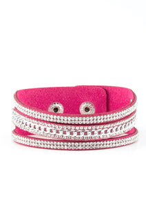 Rows of glassy white rhinestones and a shimmery silver chain are encrusted along vibrant pink suede bands for a sassy look. Features an adjustable snap closure.  Sold as one individual bracelet.