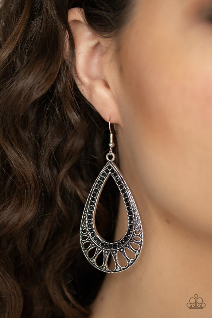 Encrusted in glittery black rhinestones, an ornate silver teardrop drips from the ear for a refined flair. Earring attaches to a standard fishhook fitting.  Sold as one pair of earrings.  Always nickel and lead free.