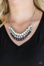 Load image into Gallery viewer, Rows of white, silver, and gunmetal pearls cascade below the collar, creating a glamorous fringe. Features an adjustable clasp closure.  Sold as one individual necklace. Includes one pair of matching earrings.  Always nickel and lead free.