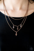 Load image into Gallery viewer, Embossed in tribal textures, dainty copper frames trickle from two glistening copper frames, creating a layered fringe below the collar. A plain copper chain is draped above the indigenous layers for a casual finish. Features an adjustable clasp closure.  Sold as one individual necklace. Includes one pair of matching earrings.  Always nickel and lead free.