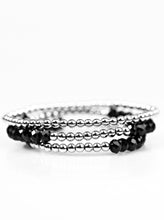 Load image into Gallery viewer, Brushed in an iridescent finish, faceted black beads and glistening silver beads are threaded along elastic stretchy bands, creating colorful layers across the wrist.  Sold as one set of three bracelets.  Always nickel and lead free.Brushed in an iridescent finish, faceted black beads and glistening silver beads are threaded along elastic stretchy bands, creating colorful layers across the wrist.  Sold as one set of three bracelets.