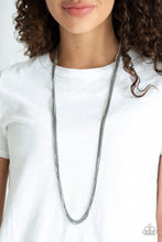 Load image into Gallery viewer, Featuring sleek square fittings, a glittery strand of white rhinestones joins dainty rows of glistening gunmetal chains down the chest for a refined flair. Features an adjustable clasp closure.  Sold as one individual necklace. Includes one pair of matching earrings.  Always nickel and lead free.