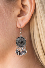 Load image into Gallery viewer, Radiating with a sunburst pattern, a glistening silver frame is dotted with a black bead. Brushed in an antiqued finish, ornate silver teardrops swing from the bottom of the tribal inspired frame, creating a whimsical lure. Earring attaches to a standard fishhook fitting.  Sold as one pair of earrings.  Always nickel and lead free.