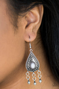 A neutral gray bead is pressed into a glistening silver teardrop dotted with studded textures. The colorful frame gives way to a silver beaded fringe for a whimsical finish. Earring attaches to a standard fishhook fitting.  Sold as one pair of earrings.  Always nickel and lead free.