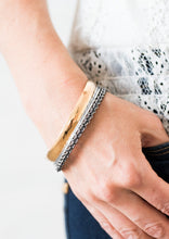 Load image into Gallery viewer, Featuring smooth, serrated, and chain-like patterns, mismatched gold, gunmetal, and silver bangles stack across the wrist for a sassy industrial style.  Sold as one set of four bracelets.