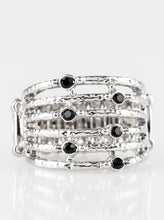 Load image into Gallery viewer, Delicately hammered in shimmer, dainty silver bars stack across the finger, coalescing into an airy band.Delicately hammered in shimmer, dainty silver bars stack across the finger, coalescing into an airy band. Glittery black rhinestones dot the bands for a refined finish. Features a stretchy band for a flexible fit.  Sold as one individual ring.