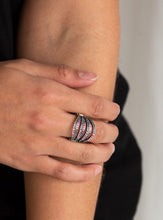 Load image into Gallery viewer, Dotted in sections of glittery pink rhinestones and shimmery silver studs, raised and lowered silver bars stack across the finger for an edgy layered look. Features a stretchy band for a flexible fit.  Sold as one individual ring.  