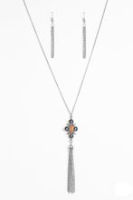 Load image into Gallery viewer, Brushed in an antiqued shimmer, ornate silver beads coalesce into an artisan inspired pendant. Infused with an orange beaded center, the colorful pendant gives way to a shimmery silver tassel for a seasonal finish. Features an adjustable clasp closure.  Sold as one individual necklace. Includes one pair of matching earrings.
