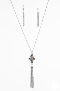 Brushed in an antiqued shimmer, ornate silver beads coalesce into an artisan inspired pendant. Infused with an orange beaded center, the colorful pendant gives way to a shimmery silver tassel for a seasonal finish. Features an adjustable clasp closure.  Sold as one individual necklace. Includes one pair of matching earrings.