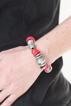 Load image into Gallery viewer, Embossed in a whimsical floral pattern, chunky silver beads, mismatched silver accents, and fiery red beads are threaded along an elastic stretchy band for a seasonal look.  Sold as one individual bracelet.  Always nickel and lead free.
