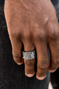 A thick gunmetal band has been hammered in shimmery detail for a metro inspired look. Features a stretchy band for a flexible fit.  Sold as one individual ring.  Always nickel and lead free. 