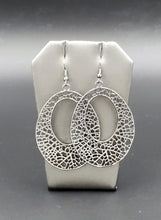 Load image into Gallery viewer, A glistening gunmetal teardrop filigree filled frame swings from the ear for a whimsical look. Earring attaches to a standard fishhook fitting.  Sold as one pair of earrings.